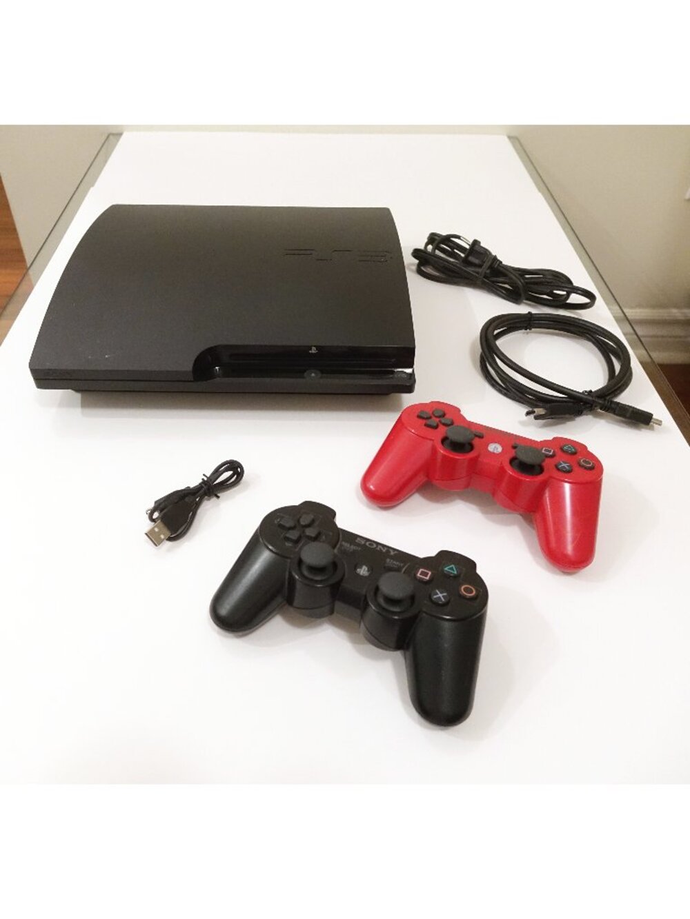 Sony PlayStation 3 PS3 Slim Console w/ two Controllers